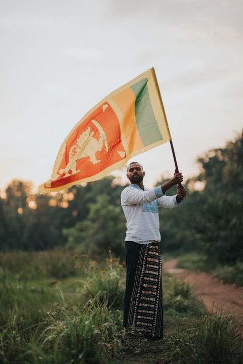 Man Waving Sri Lanka National Flag Sinha Kodiya Jathika Kodiya  (98)