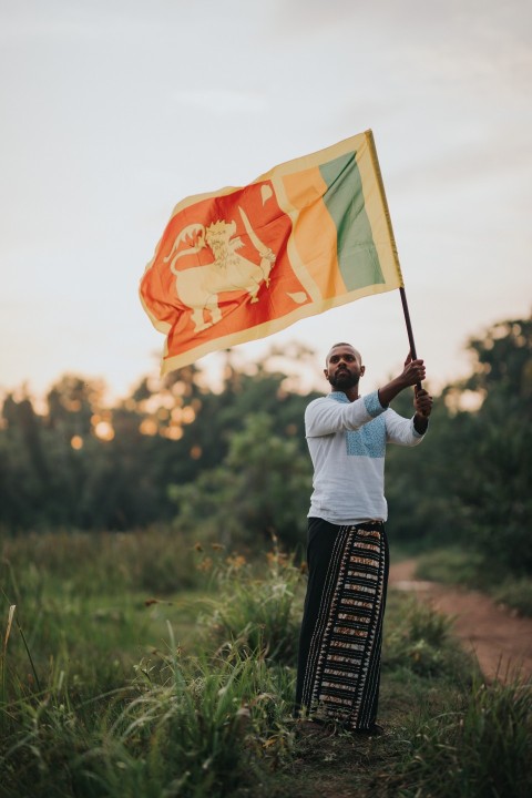 Man Waving Sri Lanka National Flag Sinha Kodiya Jathika Kodiya  (97)
