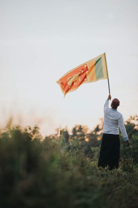 Man Waving Sri Lanka National Flag Sinha Kodiya Jathika Kodiya  (106)