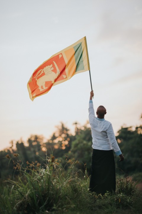 Man Waving Sri Lanka National Flag Sinha Kodiya Jathika Kodiya  (107)