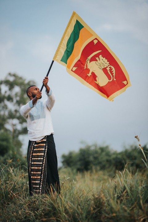 Man Waving Sri Lanka National Flag Sinha Kodiya Jathika Kodiya  (109)