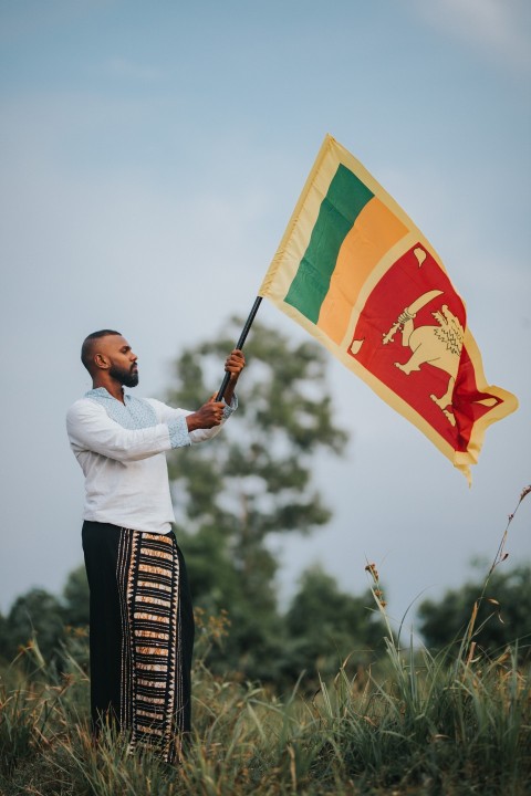 Man Waving Sri Lanka National Flag Sinha Kodiya Jathika Kodiya  (110)