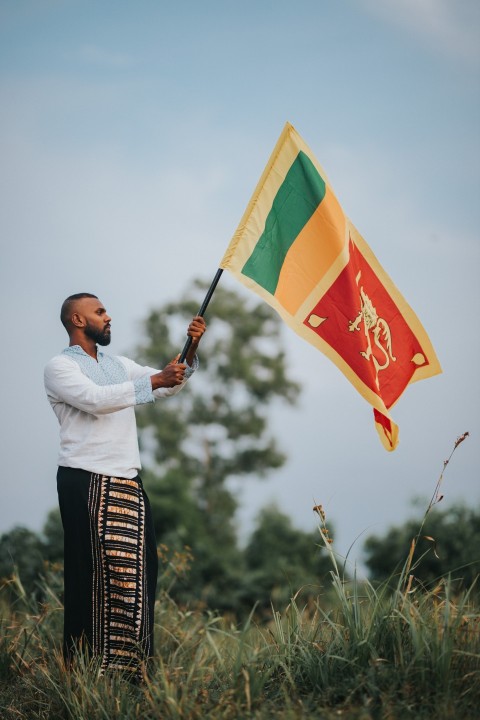 Man Waving Sri Lanka National Flag Sinha Kodiya Jathika Kodiya  (111)