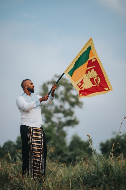 Man Waving Sri Lanka National Flag Sinha Kodiya Jathika Kodiya  (113)