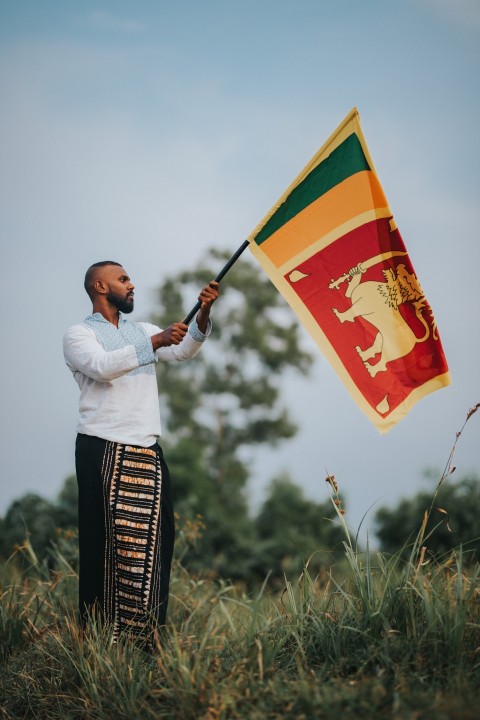 Man Waving Sri Lanka National Flag Sinha Kodiya Jathika Kodiya  (116)