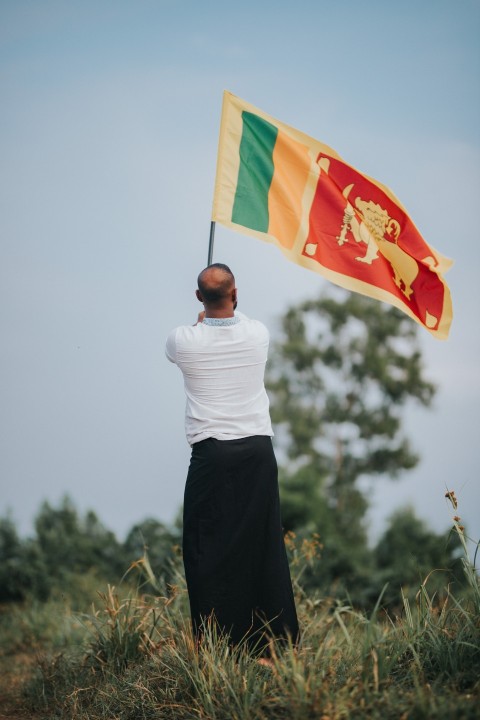 Man Waving Sri Lanka National Flag Sinha Kodiya Jathika Kodiya  (118)