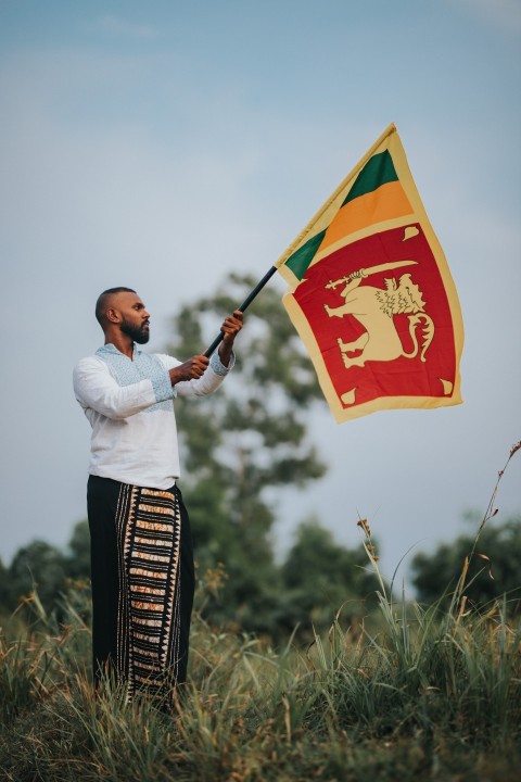 Man Waving Sri Lanka National Flag Sinha Kodiya Jathika Kodiya  (117)